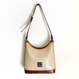 Dooney and Bourke leather trim crossbody bag